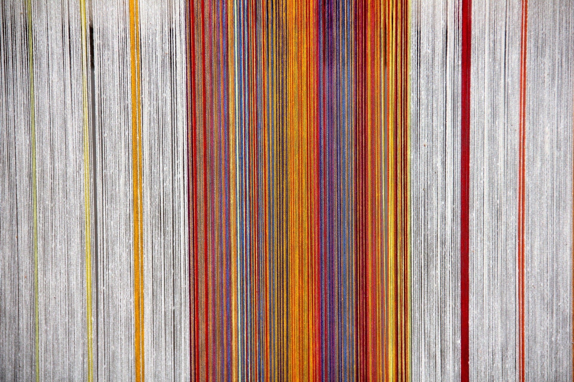 multicolor threads on a loom 